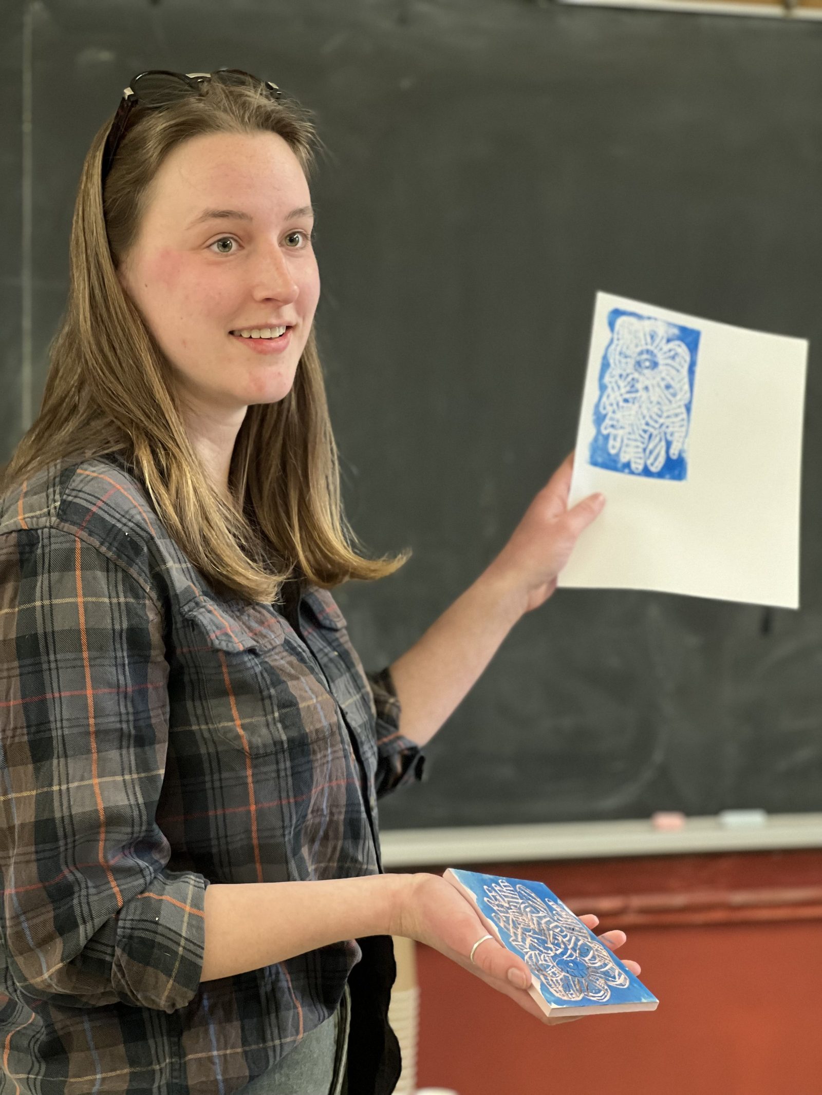 A participant painting her own piece in an Art in a Just Recovery session in Guelph, Ontario